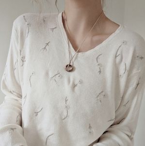 White embroidered sweater